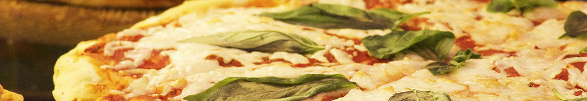 Eating Italian Pizza Sandwich at Sabatinos Sausage Deli & Pizza Co restaurant in Newport Beach, CA.